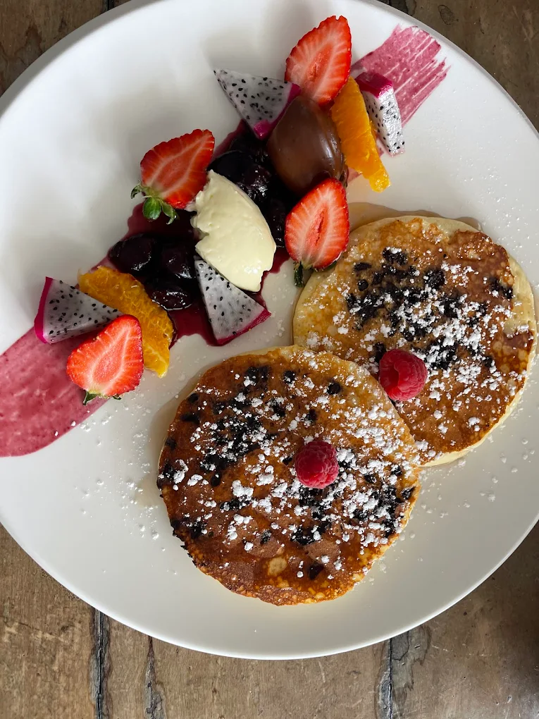 Buttermilk pancakes with fresh berries, dragon fruit and chocolate sauce at Chef N Fusion